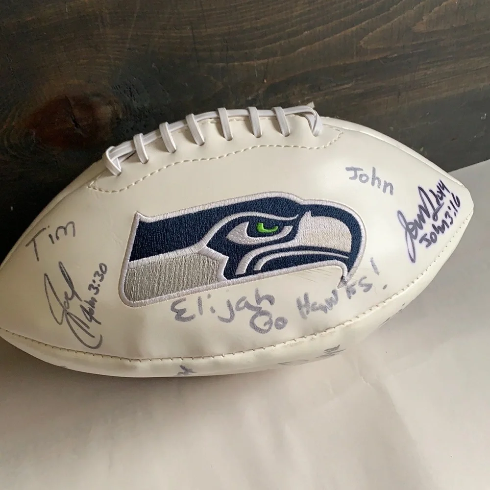 2005 NFC Champions Seahawks football with signatures read below